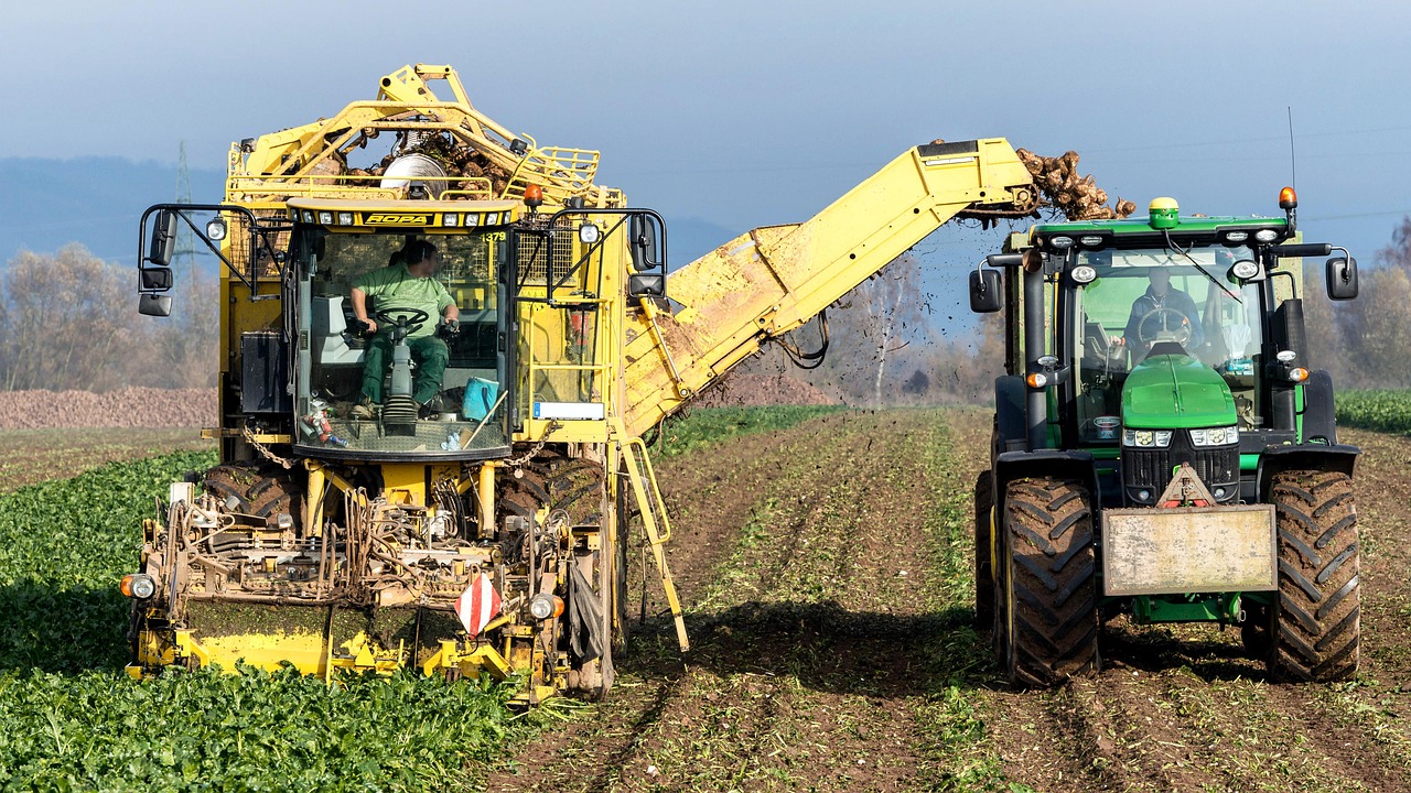 picture of farm equipment working in the field 